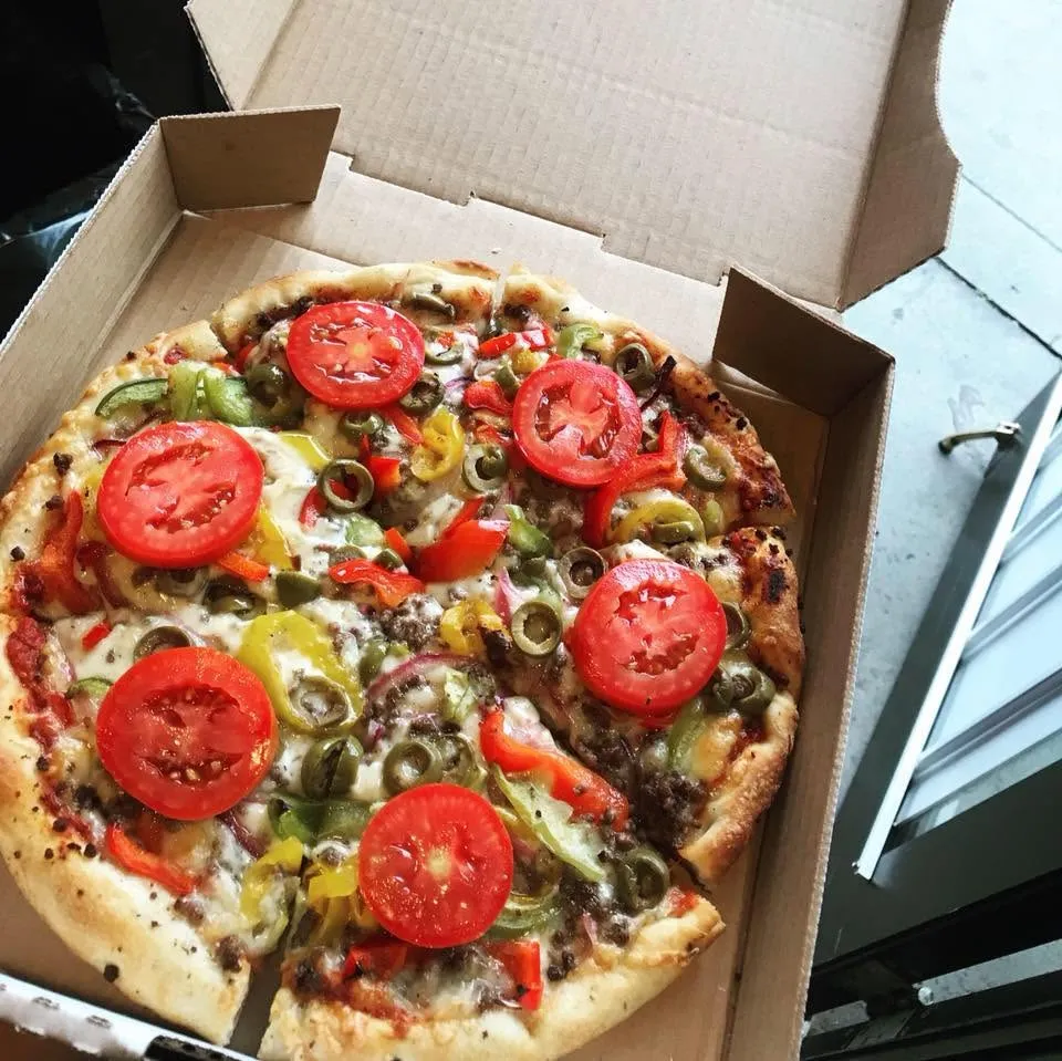 Pepperoni pizza with generous toppings at Roma's Pizzeria Bridgeland Calgary